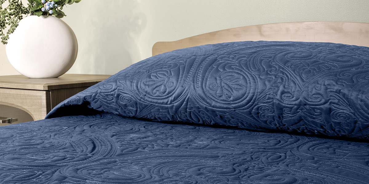 Pique Senior Living and Long Term Care bedspread